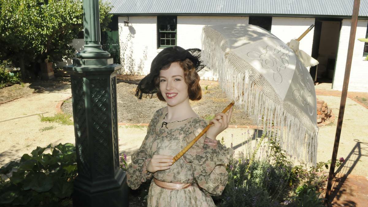 Joanna Knowles models a dress, which is believed to be from the 1890s, ahead of the Colonial Day to be held in Bathurst on April 6. Photo: Chris Seabrook/Western Advocate