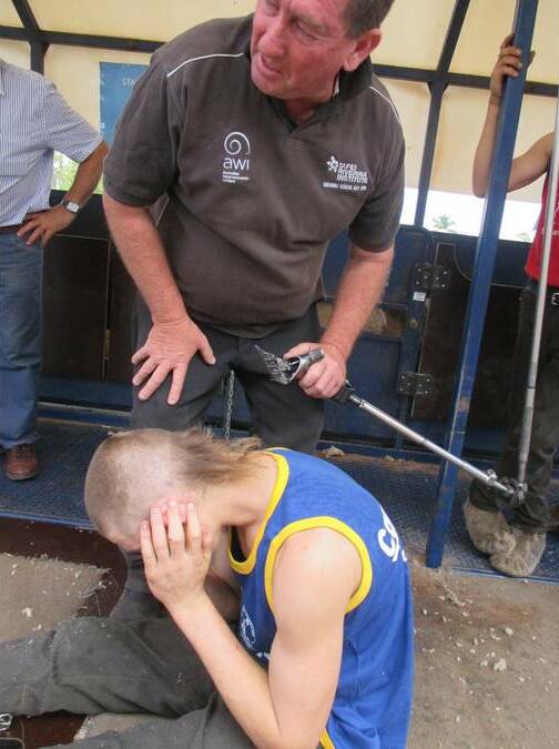 Yanco Agricultural High School student Jack Payne, 17, had his mullet shaved by Billy Garner to raise funds for CareFlight during the recent gala day shearing competition. Picture: The Irrigator