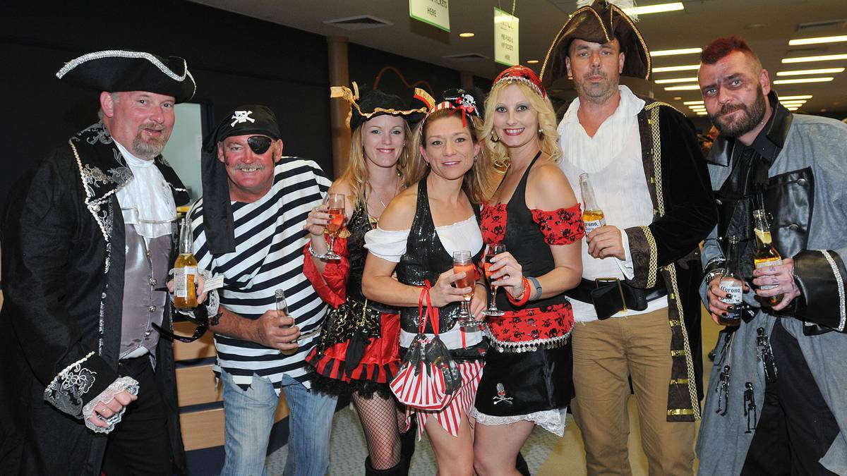 Andrew Fogarty, Mick Pooley, Larissa Fogarty, Sonya McBride, Jodie Garnett, Nigel Reeves and Ben Jamin got into the spirit at the Pirates of Treasure Cove Charity Ball. Photo Geoff O’Neill/Northern Daily Leader
