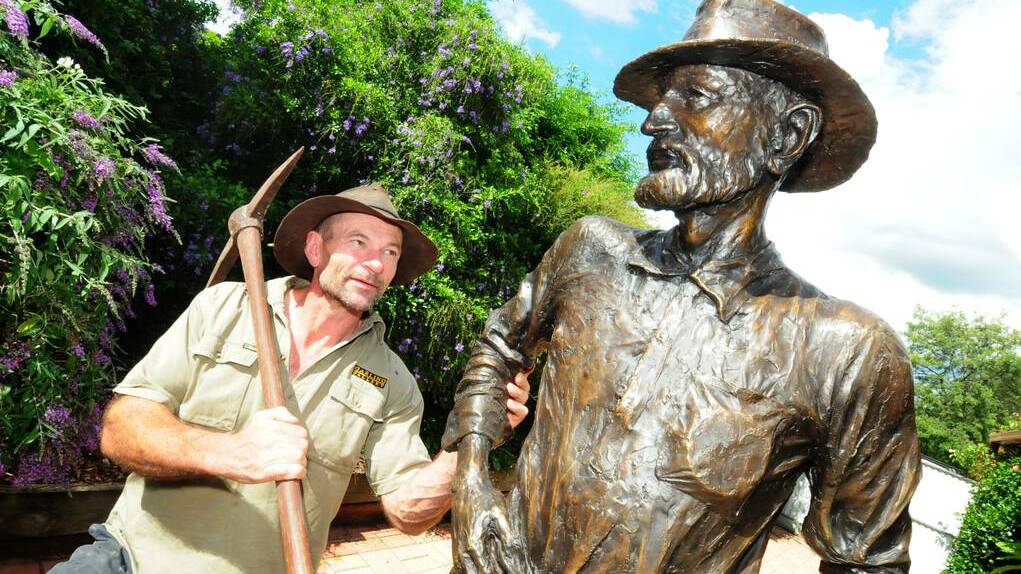 Brett Garling with a completed bronze sculpture of opal mining pioneer Charles Nettleton, which was unveiled in Lightning Ridge on Saturday. Picture: Daily Liberal