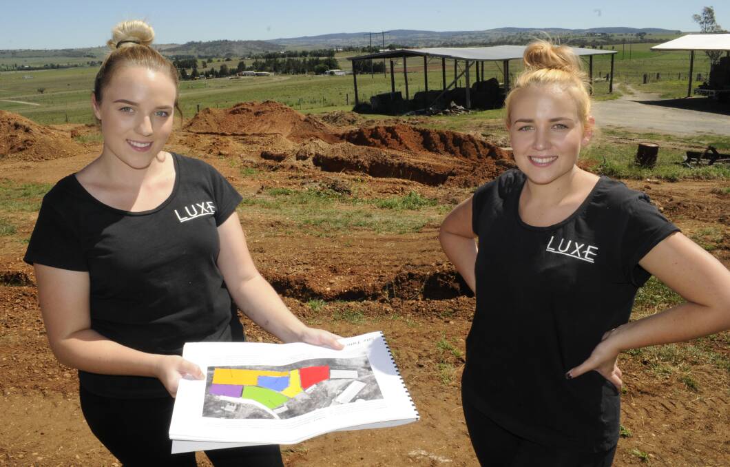 SISTER ACT: Melissa and Kayla Atkins will soon be running Bathurst’s newest purpose-built wedding function centre, with building to start within the next month. Photo: CHRIS SEABROOK 020816cweddings