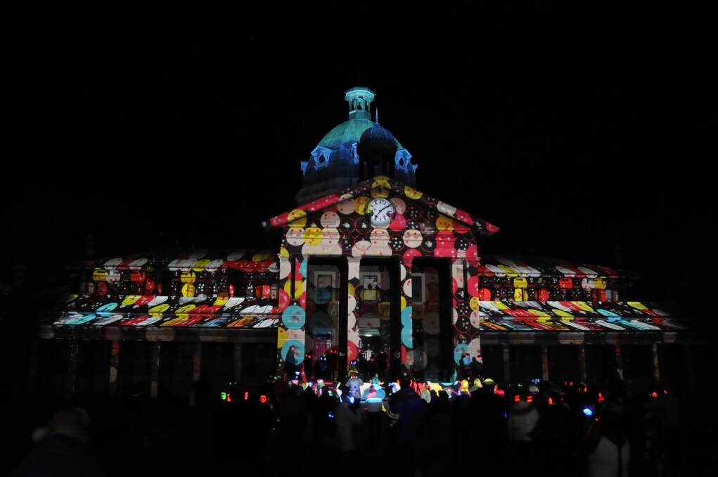 ON THE HOUSE: Bathurst Court House was once again the focal point when the Illuminate Bathurst Winter Festival began on Saturday night. Photo: CHRIS SEABROOK 070415cwfest1