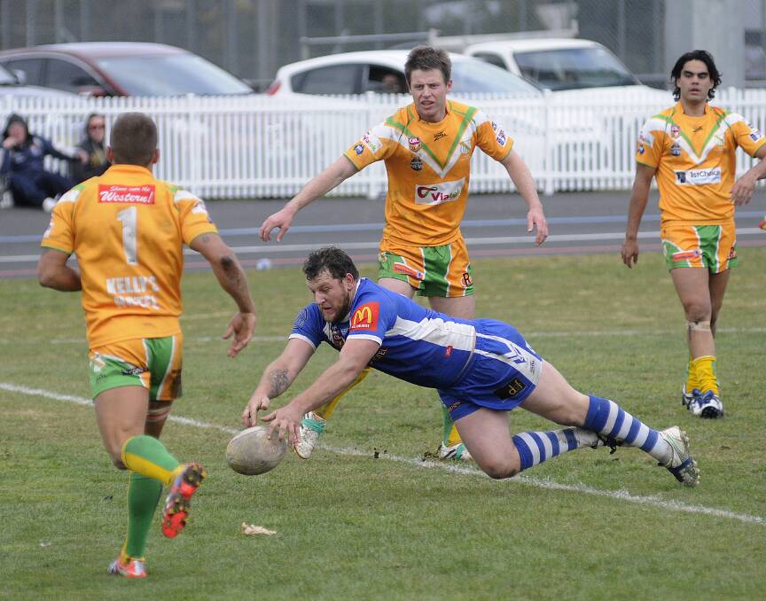 MAGIC MOMENT: Dave Howard’s diving effort was met with huge cheers from the home fans as his try sparked a St Pat’s revival against Orange CYMS yesterday. Pat’s won 32-10 in a result that gives them the minor premiership. Photo: CHRIS SEABROOK 081714cpats1