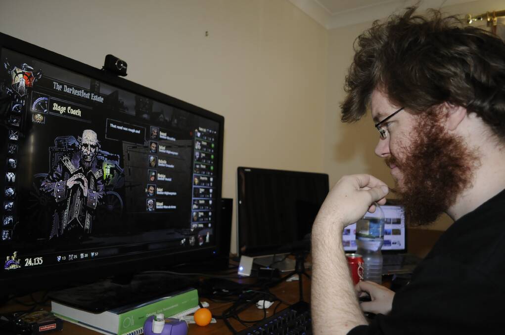 GAME ON: Bathurst gamer Lucas Graves, along with his fellow gamers, raised money for a children’s charity after a seven-day gaming marathon last week. Photo: CHRIS SEABROOK 020916cgamer1