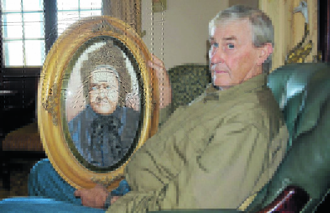 MATRIARCH: Kevin Webb, from Sydmouth Valley in Tarana, with a portrait of his great-grandmother Ann Webb. Mr Webb is calling family members from across the state to join in the 145th anniversary celebrations of the church on May 29.