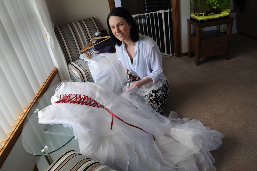 SEEKING SUPPORT: Naomee Wotton from Angel Gowns will be in Bathurst next month for an open day and donation drive at Charles Sturt University. Photo: STEVE GOSCH 0808sgangelgowns2