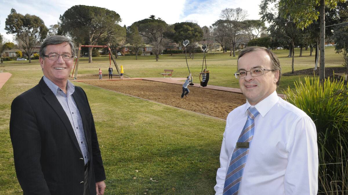 PARK BOOST: Bathurst Regional Council mayor Gary Rush and general manager David Sherley discuss upcoming additions to the Adventure Playground. Photo: CHRIS SEABROOK 071414cycles