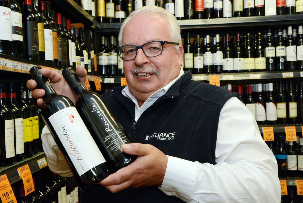 COOL CLIMATE WINES: Chief steward Mark Haley shows off some the local wines.  Photo: PHILL MURRAY 073014pmark2