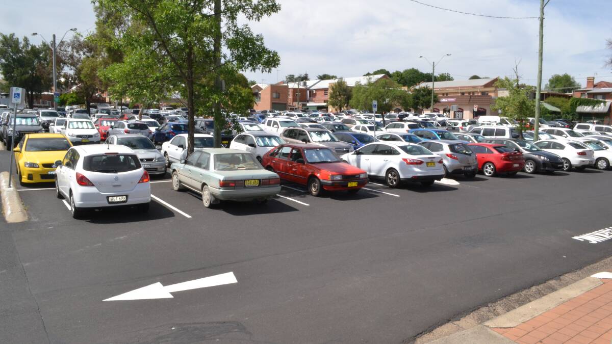 FULL HOUSE: As Bathurst Regional Council considers a request for more timed parking in the council-run car park behind Bathurst RSL, it’s not hard to see why members are having trouble finding an empty space. This Snapshot was taken
about 10.30am yesterday and there wasn’t a single space to spare. Photo: BRIAN WOOD 120314park