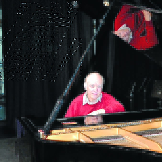 MASTER MUSICIAN: Concert pianist Gil Sullivan takes a seat at Bathurst’s new grand piano prior to Saturday’s performance. Photo: LOUISE EDDY 093015GilSullivan