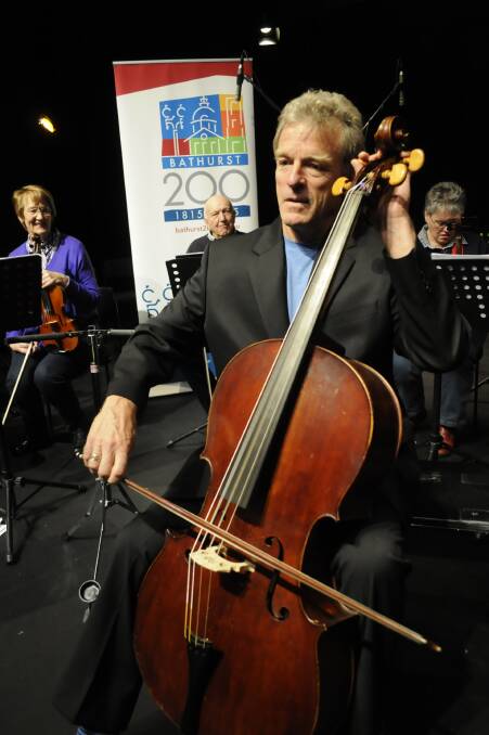 PIECE OF HISTORY: Renowned cellist David Pereira will play Mrs Macquarie’s cello during his performance at Bathurst Memorial Entertainment Centre this evening. Photo: CHRIS SEABROOK 042815cello1