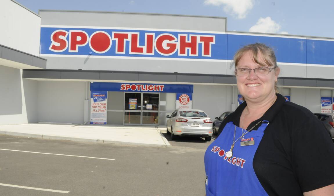 WE’RE OPEN: Bathurst Spotlight department team leader Heather Skennerton outside the new store in Kelso which will hold its official opening today. Photo: CHRIS SEABROOK 020916cspotlite
