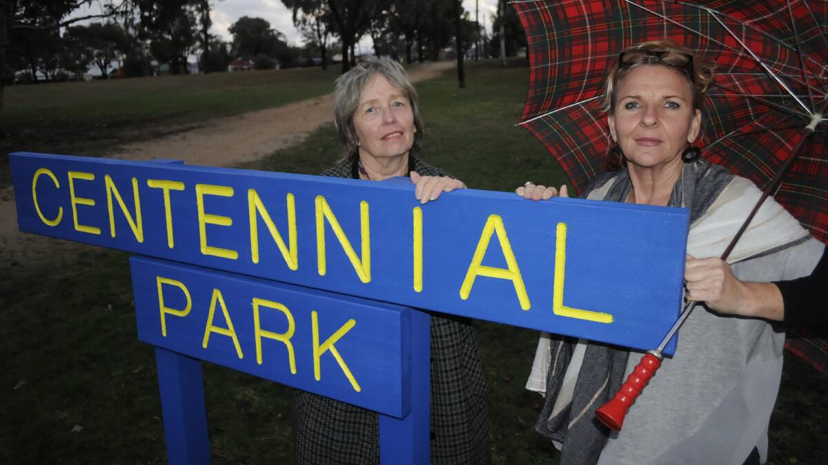 FIGHT FOR SPACE: Vianne Tourle and Bernadette Wood from the Friends of Centennial Park group want that slice of green space retained and not considered as a greenfield site in Bathurst Regional Council’s vision for a new community arts precinct. Photo: CHRIS SEABROOK 050916c 