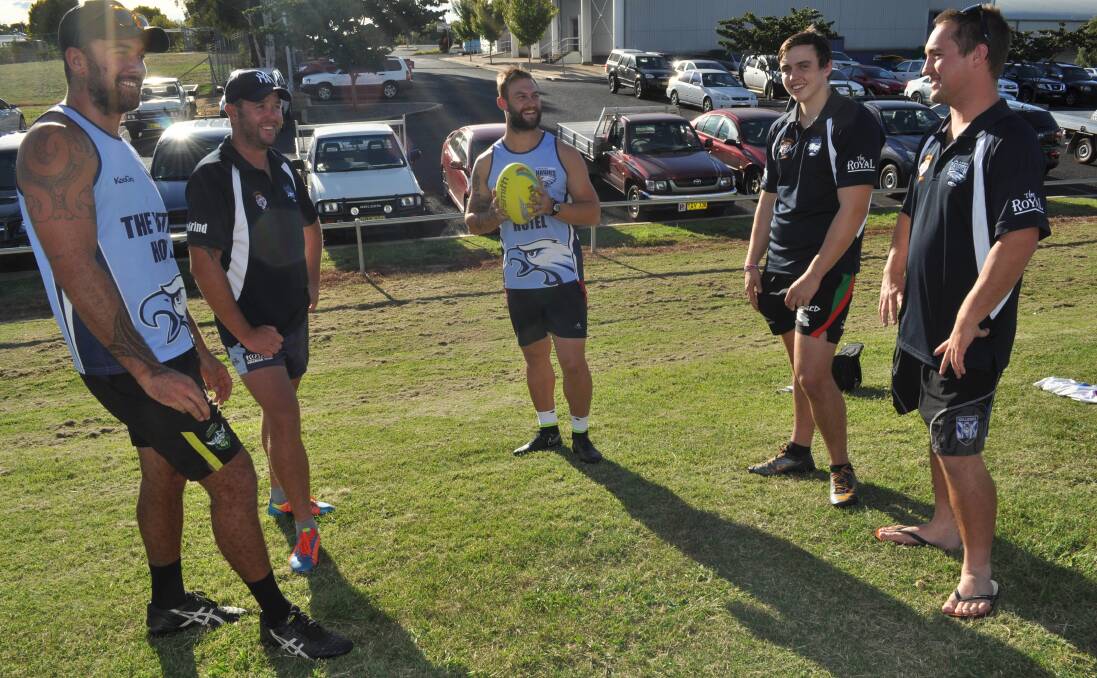 COACHING TEAM: Jared Brodrick (premier league), Brad Cleal (first division), Brock McGarity (premier league), Matt Boss (under 18s) and Nathan Howarth (league tag) will look after the mentoring roles of each of the two blues four grades in 2015. Photo: NICK McGRATH 0223nmhawks1