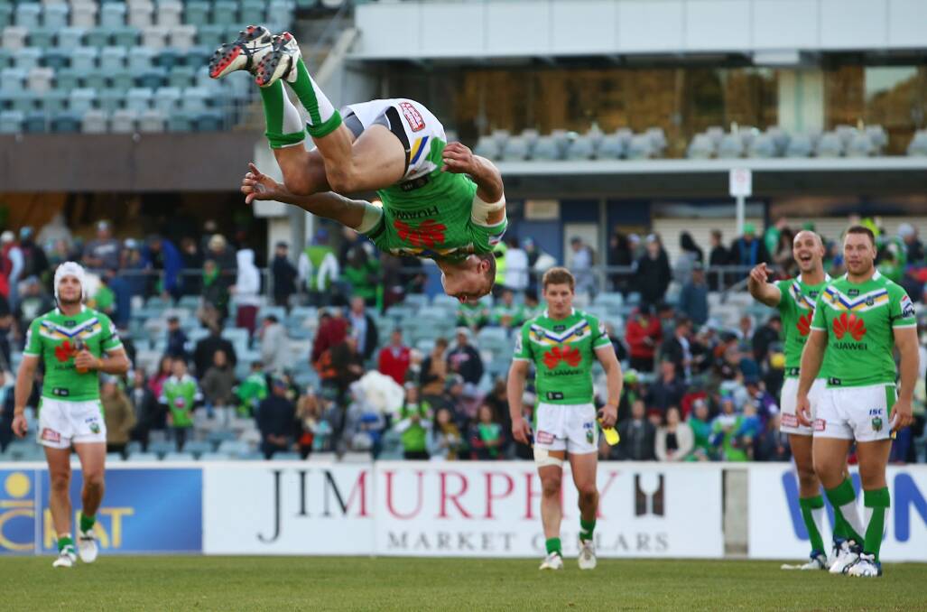 FLIPPER: Orange’s Jack Wighton busts out a backflip after the Raiders’ 24-22 win over the Melbourne Storm on Sunday. Photo: GETTY IMAGES