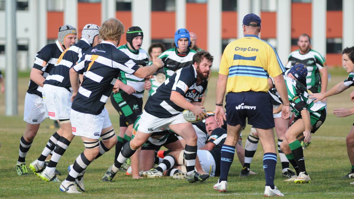 SWOOP: Magpies hooker Nick Rodd trucks it up in his side's massive win over CSU Orange on Saturday. Photo: KELLY LUCAS 0613klrugby1
