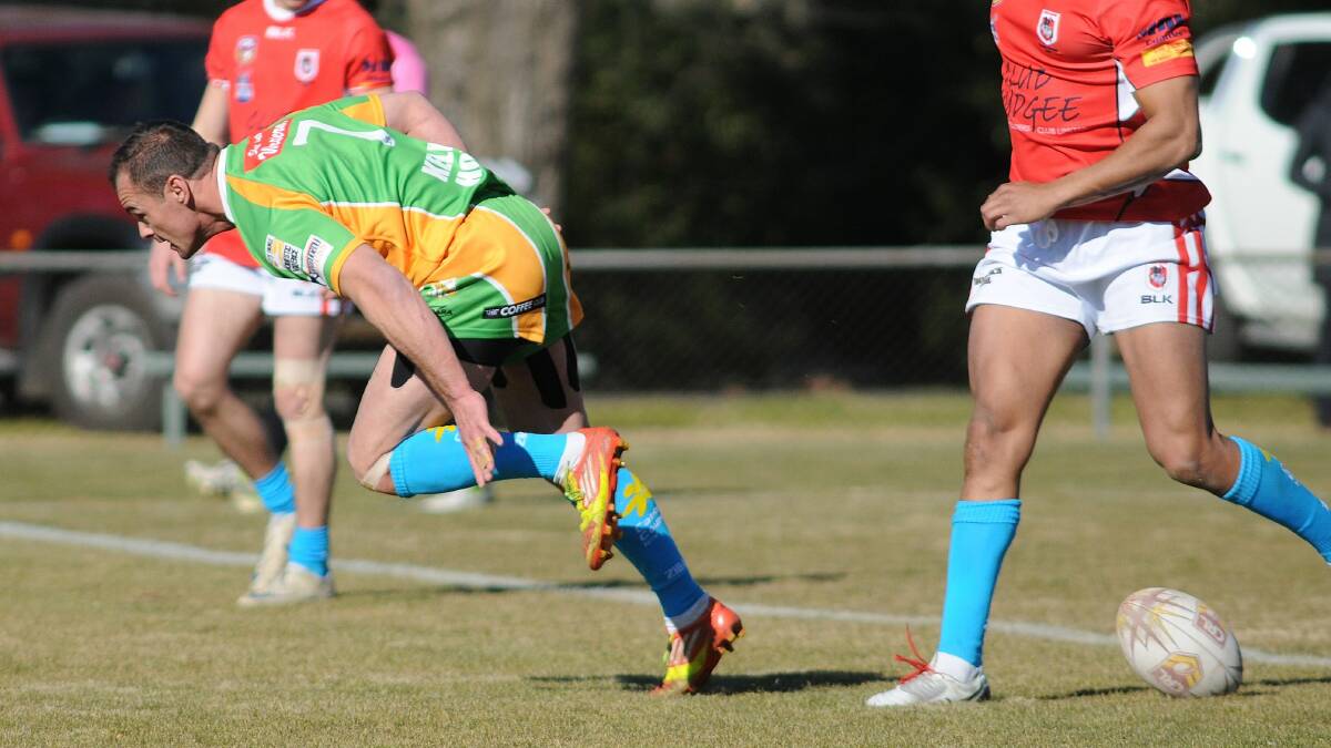 OVER AND OUT: Mick Sullivan scores his one and only try for the 2014 season against Mudgee two weeks ago. The premiership-winning coach is already looking forward to 2015. Photo: STEVE GOSCH 0810sgleague24