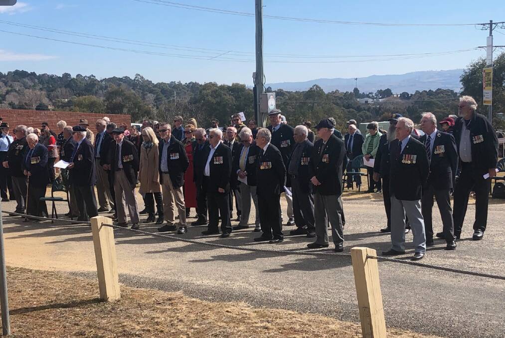 REMEMBERANCE: Veterans standing at attention during Sunday's service at the Bathurst Vietnam Veterans Memorial Park. Photo: SUPPLIED