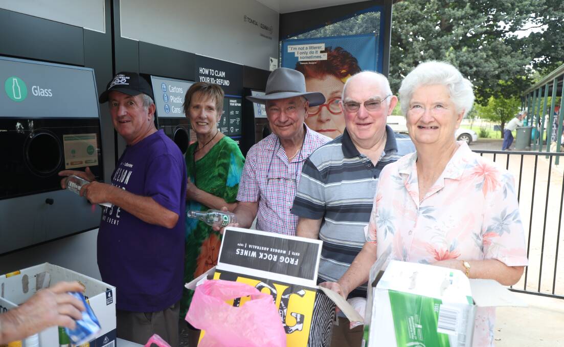 MONUMENTAL EARNS: Councilor Bobby Bourke, Jan Page, Ian Bates and Stan and Joy Richens making bottle and can donations to the Carillon. Photo: PHIL BLATCH 010519pbbell1