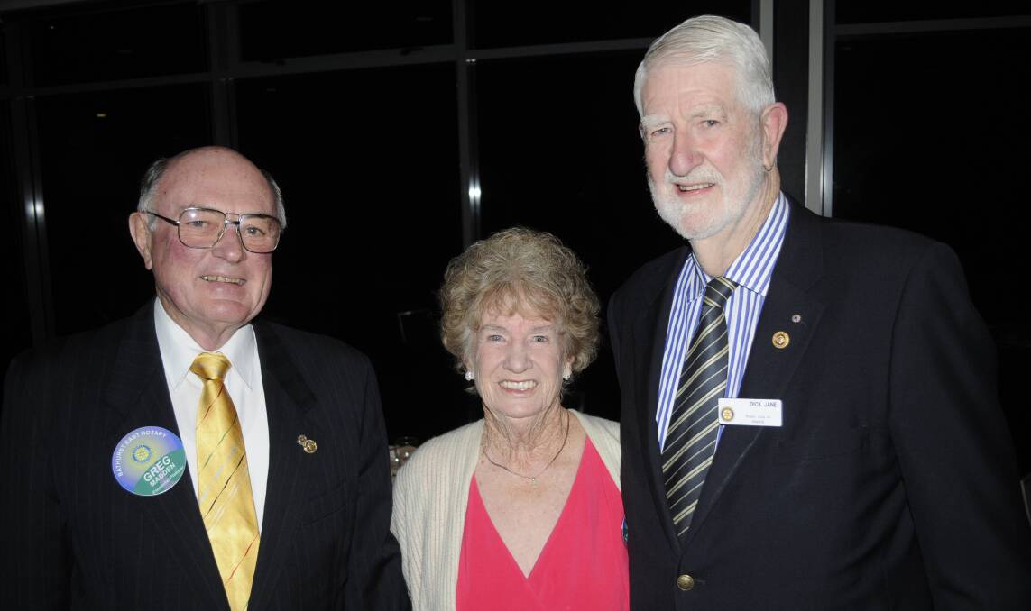 PARTY PEOPLE: Greg Madden with Jan and Richard Jane at the Rotary dinner held Rydges Mount Panorama. Photos: CHRIS SEABROOK 070216crotary5