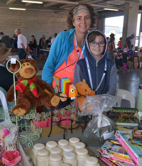 GARAGE DAY: Andrea and Darcy Meale, 11, were raising money for the Fred Hollows Foundation at the annual Mount Panorama Community Garage Sale on Sunday. Photo: NADINE MORTON 121116nmsale4a