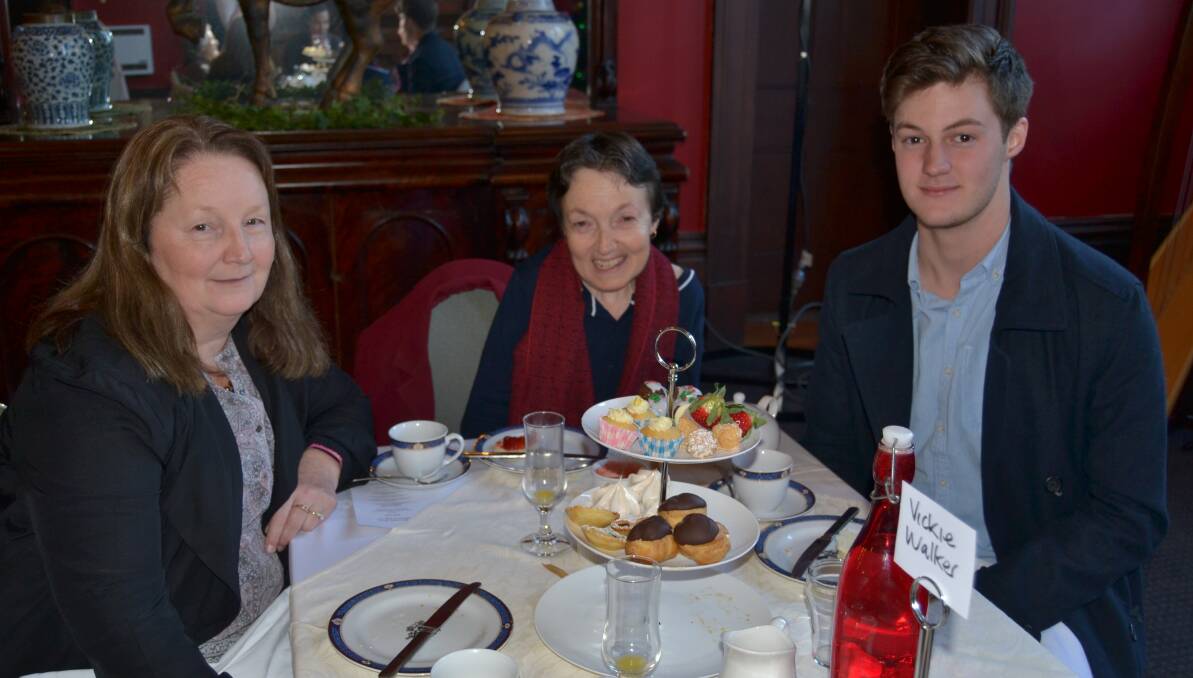 HAPPY BIRTHDAY: Sheryl Roberson and Vickie Walker with David Moodi who was celebrating his belated 18th birthday by having high tea on Sunday.