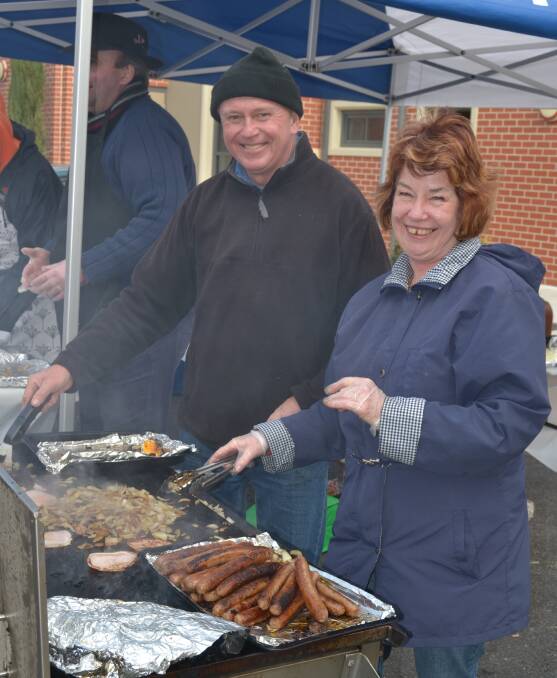 FEDERAL FRY UP: Cathedral of St Michael and St John Restoration Fund Committee chair Phil Burgett and member Margaret Gibson. Photo: NADINE MORTON