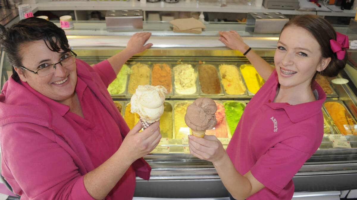 BUSINESS BOOST: Annie’s Ice-Cream Parlour's Jo Moore and McKenzie Barwick said Saturday's festival crowds were good for CBD businesses. Photo: CHRIS SEABROOK 070416cannies1