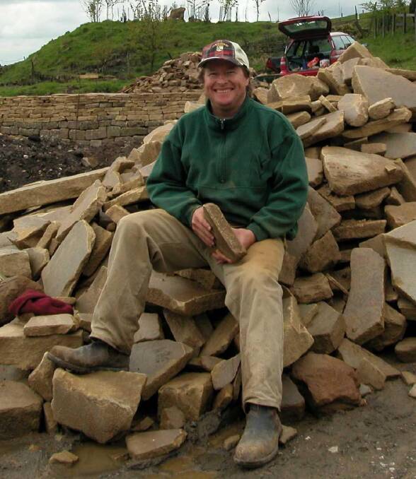 MASTER CRAFTSMAN: Dry stone wall instructor Geoff Duggan is keen to share his passion for this ancient craft. Photo: SUPPLIED 091917stone
