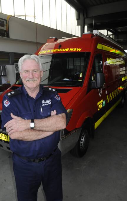 NEW GEAR: Fire and Rescue NSW Station Officer Chris Sanders with the station's new hazardous materials unit received this week. Photo: CHRIS SEABROOK 081716chazmat2