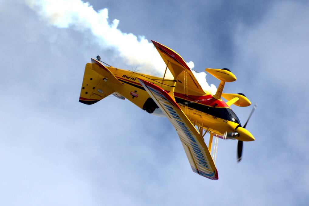 SKY HIGH: One of the displays during the air show at the inaugural Soar, Ride and Shine event at Bathurst Airport in 2016. Photo: JOHN GRIFFIN 091917