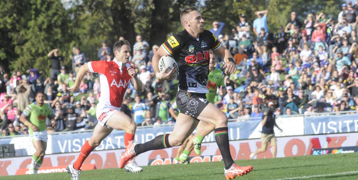 UNDER LIGHTS: Penrith Panthers player Bryce Cartwright during a game against the Canberra Raiders at Carrington Park in April. New lights at the park will allow for televised NRL night games. Photo: CHRIS SEABROOK 043016cnrl2