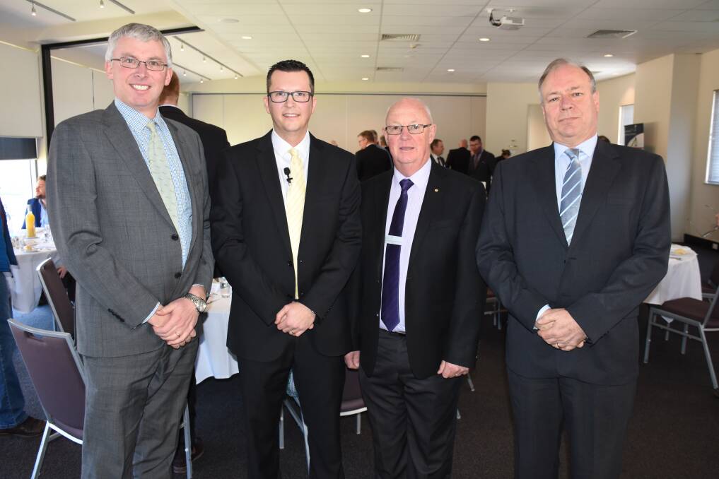 NETWORKING: Kenny Spring Solicitor's Angus Edwards, Bathurst Regional Council economic development manager, mayor Graeme Hanger and Reliance Bank's Adrian Finch. Photo: NADINE MORTON 062217nmbusiness1