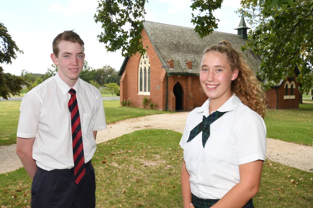 GREAT MARKS: All Saints' College Year 10 students Ralph Nicholls, 15, and Bridget Ellis,15, are among the school's high-performing students. Photo: CHRIS SEABROOK  031418cnaplan