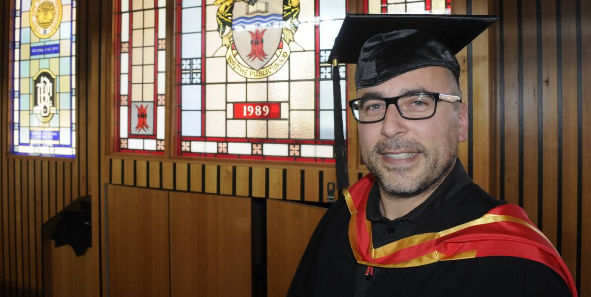 CONGRATULATIONS: Claudio Dionigi will be one of almost 1000 Charles Sturt University students who will graduate this week. Photo: CHRIS SEABROOK 121316csugrad1