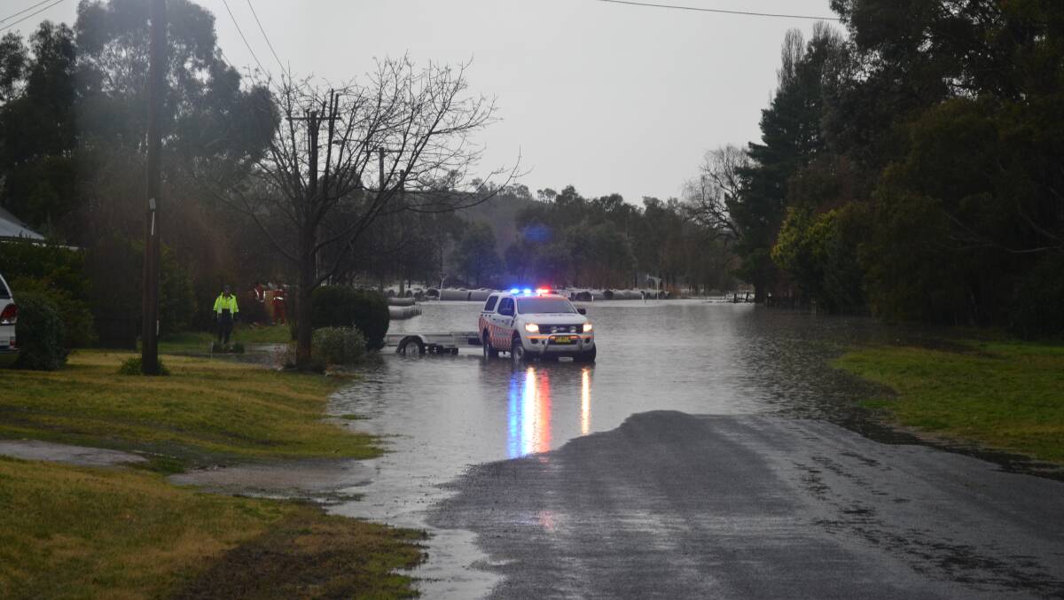 FLOODED: Floodwaters in Perthville. Photo: NADINE MORTON 072016nmflood27