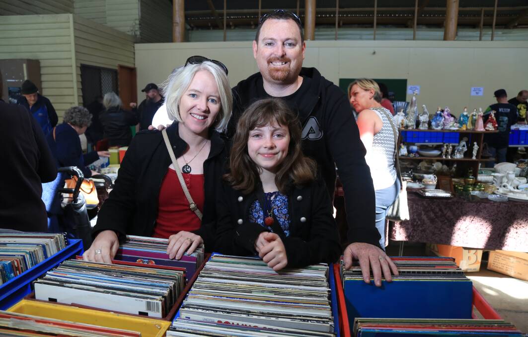 MUSIC LOVERS: Leanne, Caitlyn and Alan Poll were among the crowds at a previous Record, CD and Vintage Fair. Photos: PHIL BLATCH 101516pbvintage4