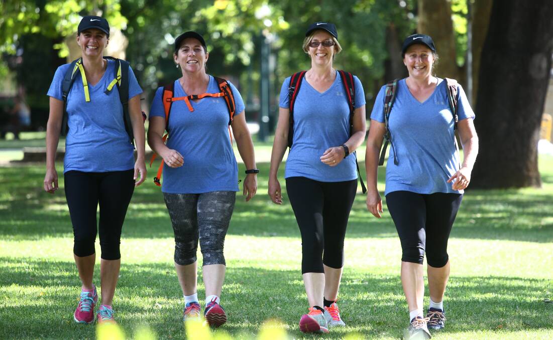 BOOTS ON: Andrea Meale, Nadene Rodham, Julie Newham and Paula Charnock are taking part in the Coastrek challenge. Photo: PHIL BLATCH 022517pbtrek1