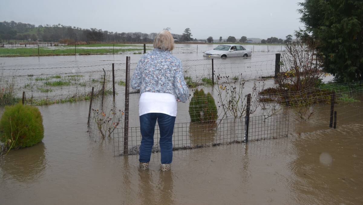 COMMUNITY CONCERN: Her house might have been flooding, but Lorraine Fischbeck’s concern was for her fellow Perthville community members during the July, 2016 floods. Photo: NADINE MORTON 072016nmflood12