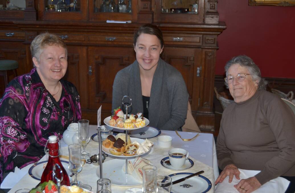 TEA TIME: Mary Roberson, Sarah Walker and Aileen Roberson were there to celebrate. Photo: NADINE MORTON 070316nmtea2