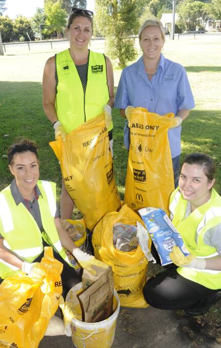 HELPING HAND: Keir Shereb and Jayne Rosser (front), Nikita Williams and Alison Thompson were among the few volunteers for Clean Up Australia Day this year.