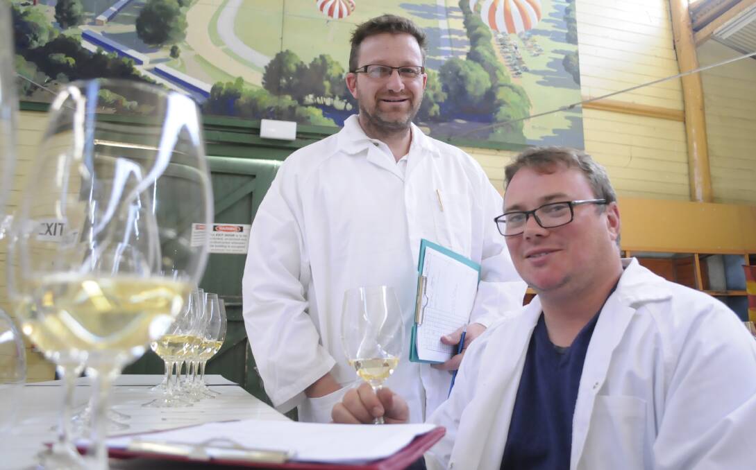 NOSE FOR QUALITY: Wine judges Andrew Locke and Nick O'Leary at the National Cool Climate Wine Show. Photo: CHRIS SEABROOK 102516cwine2a