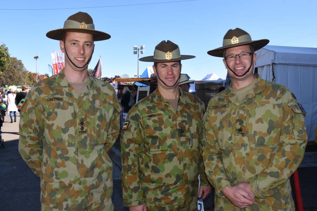JOIN THE RANKS: 1st/19th Royal New South Wales Regiment Bravo Company's Lieutenant Peter Greening, Warrant Officer 2 Paul Mew and Major Scott Ferguson invited you along to the open night. Photo: NADINE MORTON 042917nmshow2