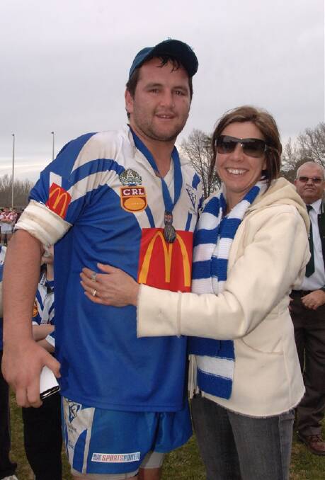 NEW PASTURES: Wade Judd, pictured with Liz Scott after winning the inaugural Dave Scott Medal in the 2008 Group 10 premier league grand final, will wear Oberon colours next year as the Tigers’ captain-coach. Photo: ZENIO LAPKA 090708zscottmedal