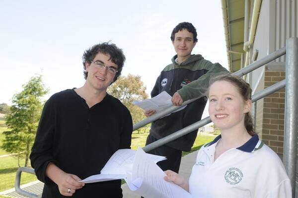DOING THE MATHS: Kelso High HSC students Evan Stroeve, William Horspool and Jodie Muldoon are eagerly awaiting tomorrow's Mathematics Extension 1 paper after sitting their first written maths exams yesterday. Photo: CHRIS SEABROOK 102411khshsc