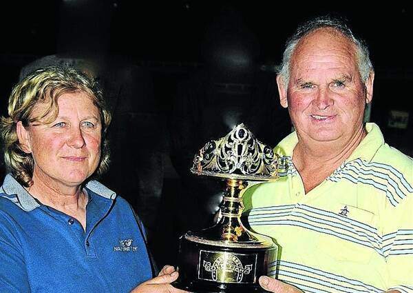 FORMIDABLE PAIR: The 2011 Gold Crown Carnival honourees, Jayne Davies and Noel Alexander, pose with one of their Gold Tiara trophies. Photo: Jim Norris - ACTION PHOTOS