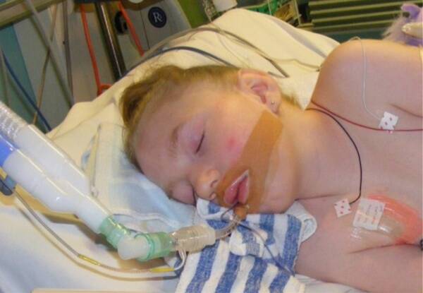 LITTLE FIGHTER: Bathurst girl Codee Holmes in a coma in Westmead Children's Hospital.