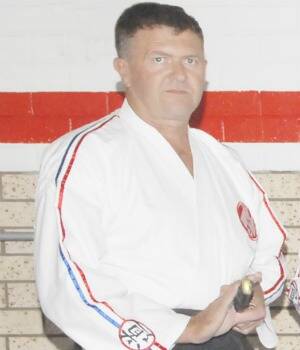 GUILTY PLEAS: Craig Hilton Neary, pictured here in his martial arts gear following a competition in 2009, has pleaded guilty to a string of drug and firearms charges.