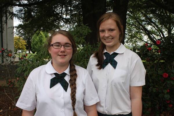 JAPAN BOUND: All Saints’ girls Courtenay Moller and Charlotte Brew.