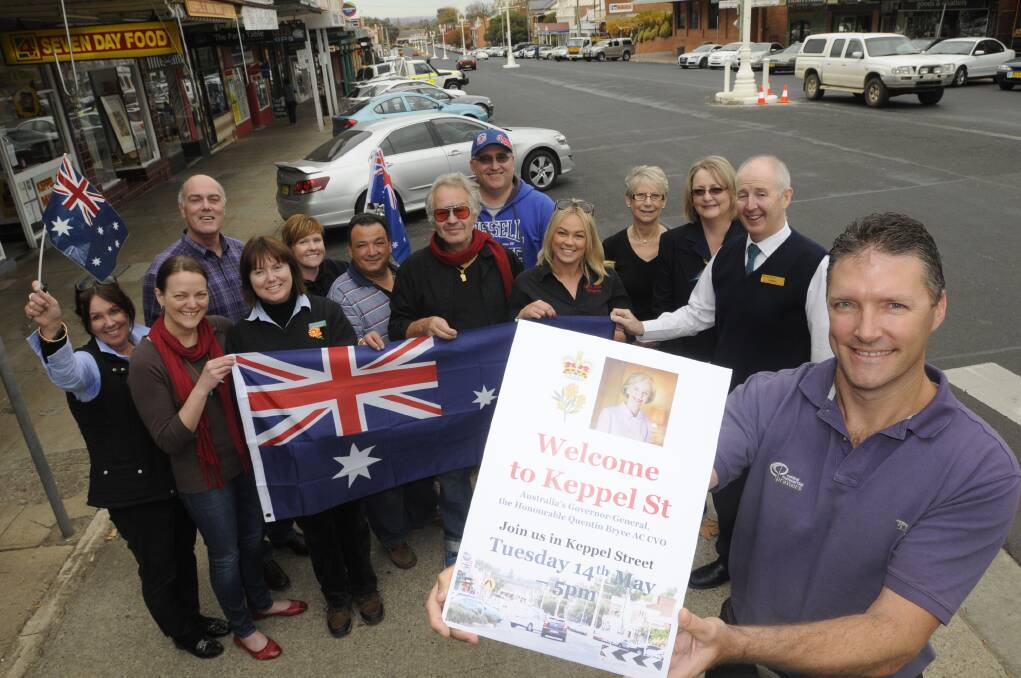 COME ON DOWN: Peter Wright, front, with fellow business owners in Keppel Street yesterday who are looking forward to the Governor-General s meet the people street walk this afternoon. Photo: CHRIS SEABROOK	 051313ckeppel